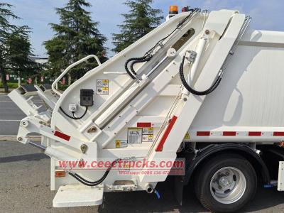Isuzu ELF rear loader garbage truck